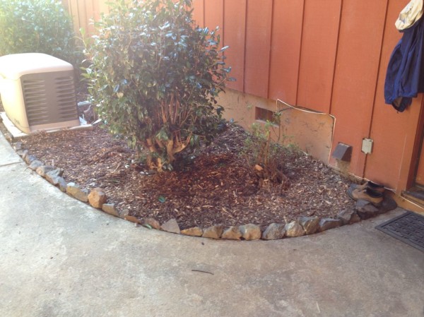 New rock border and chips to tidy up the former building zone